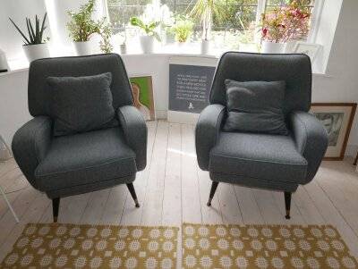 Pair of mid-century armchairs reupholstered in charcoal grey wool