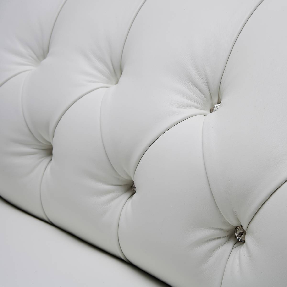 Diamond tufting pattern with crystal buttons